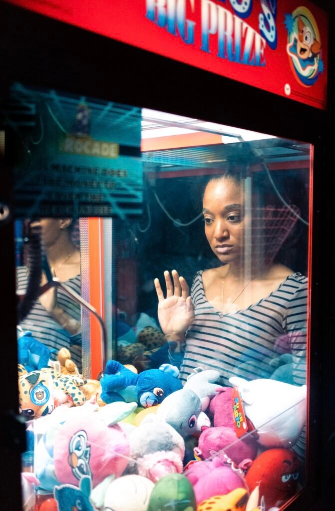 bohemian lifestyle street photography of woman in arcade scene with neon lights