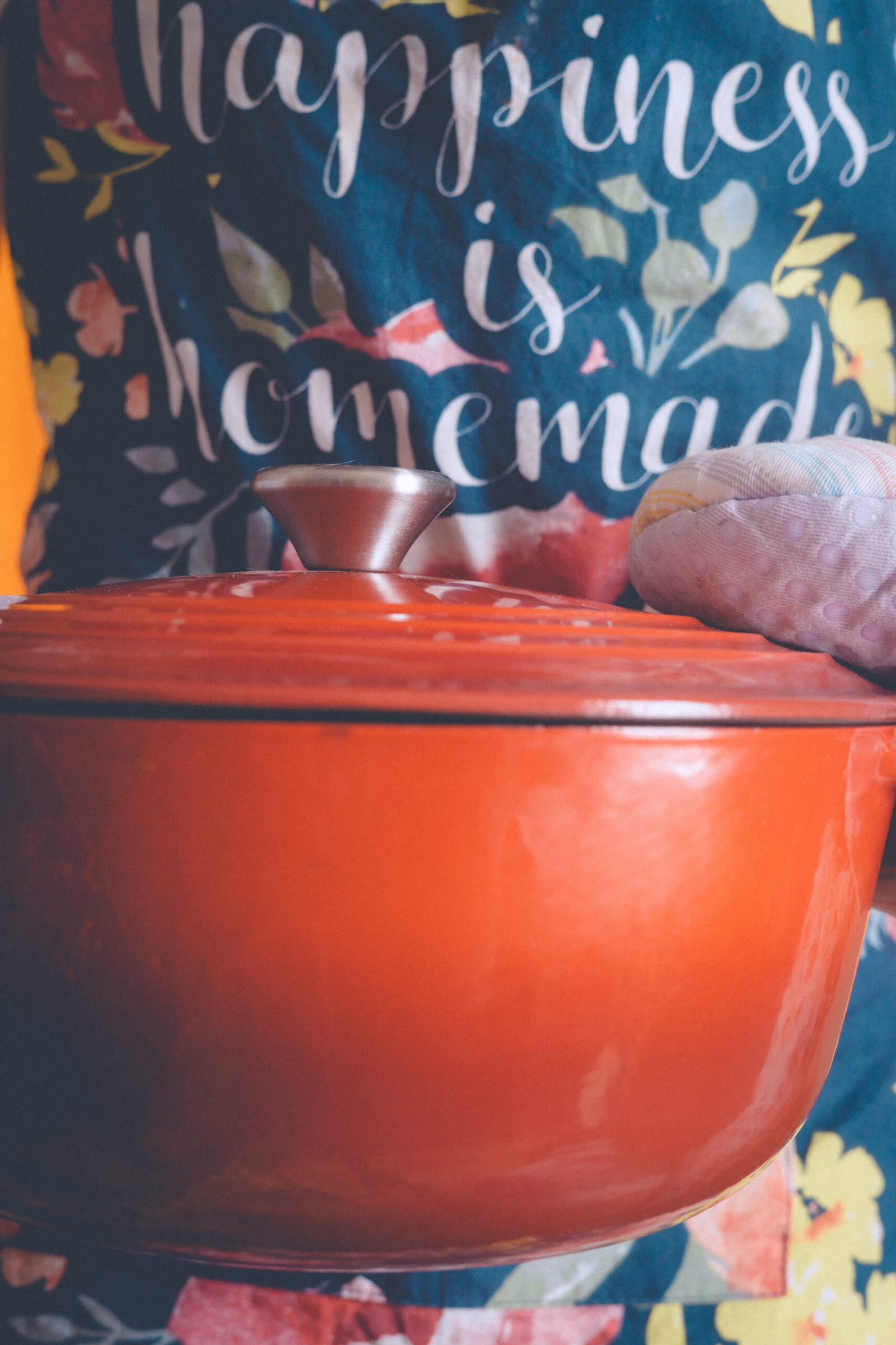 homemade butternut squash soup in a red dutch oven during a cozy slow Sunday ritual in the kitchen